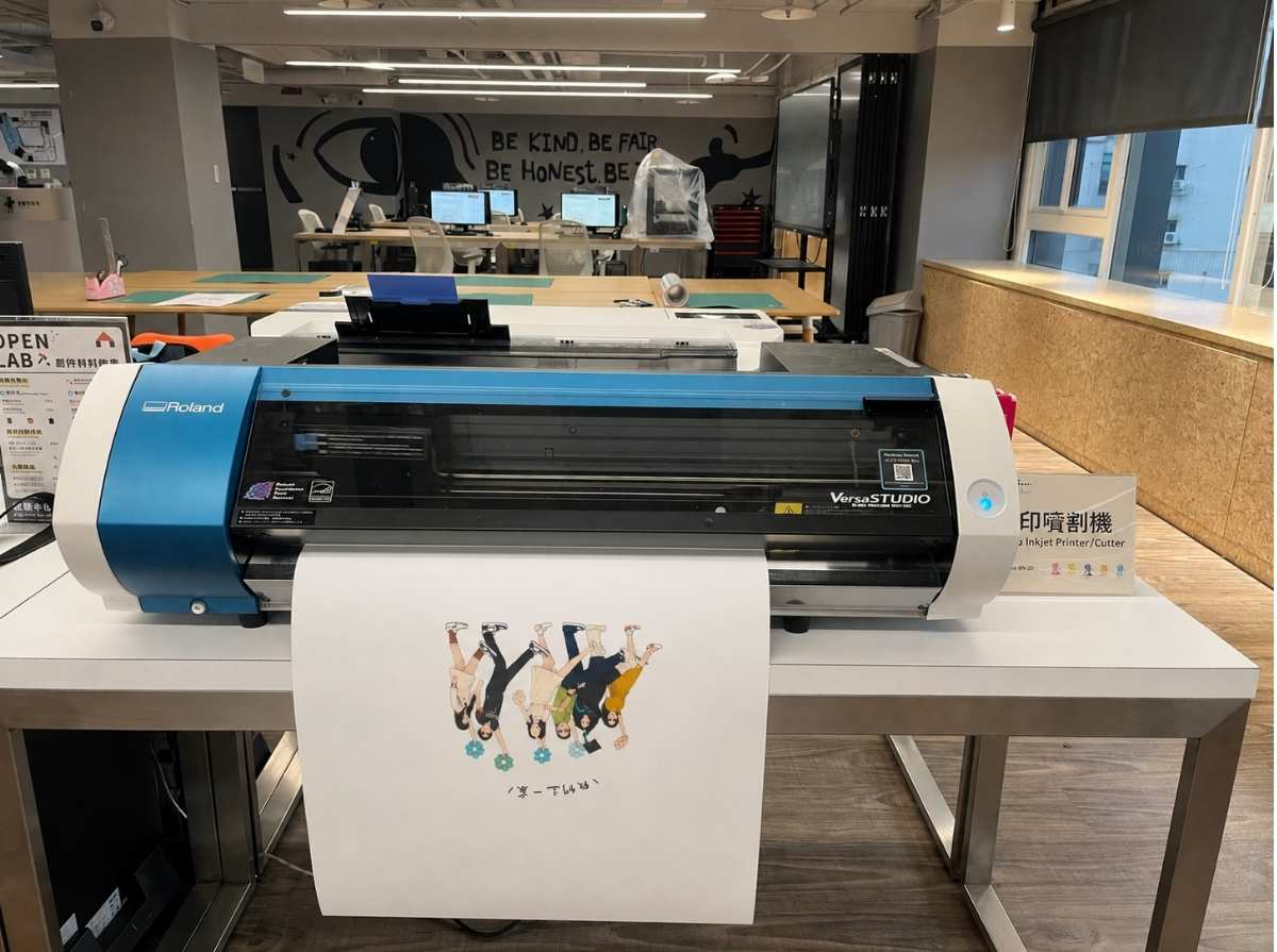 Printer producing family illustration designs for heat transfer printing.