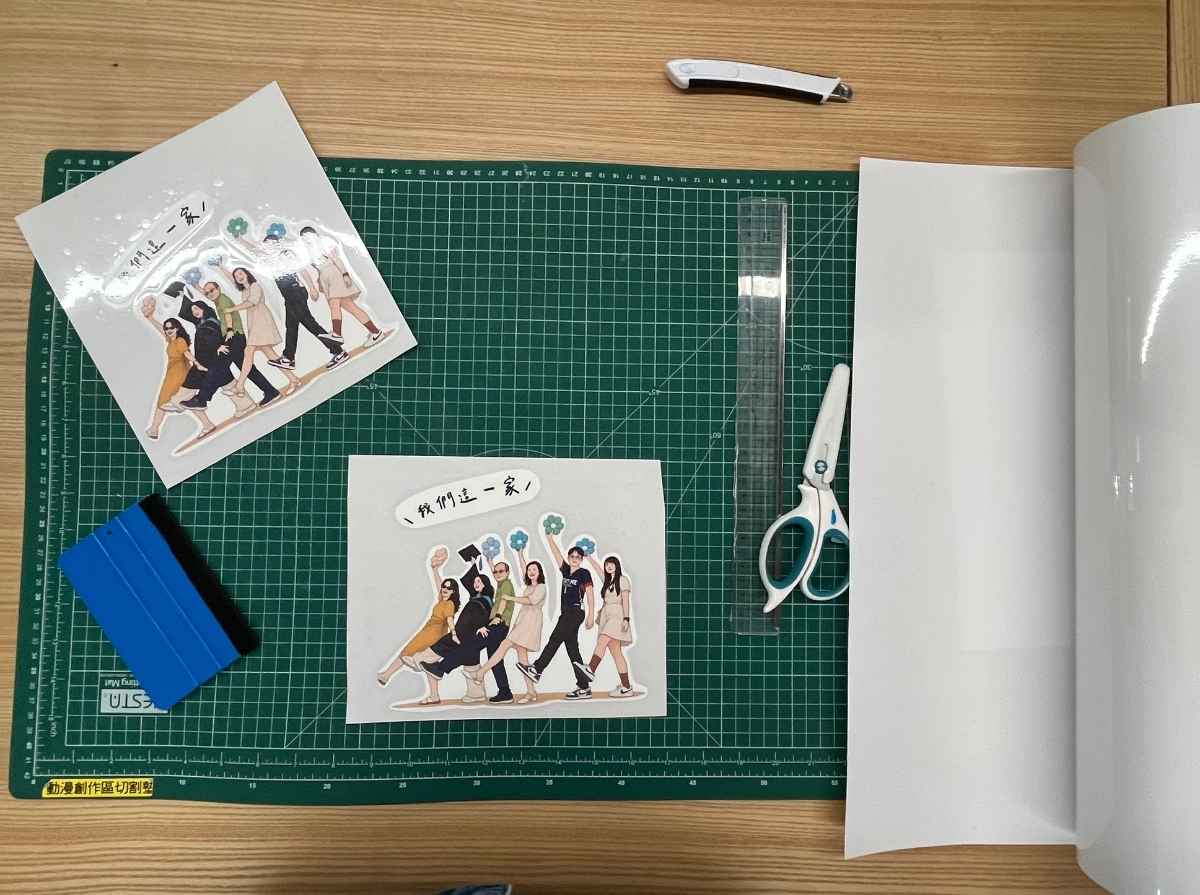 Cut family illustration designs and transfer film prepared for heat transfer printing.